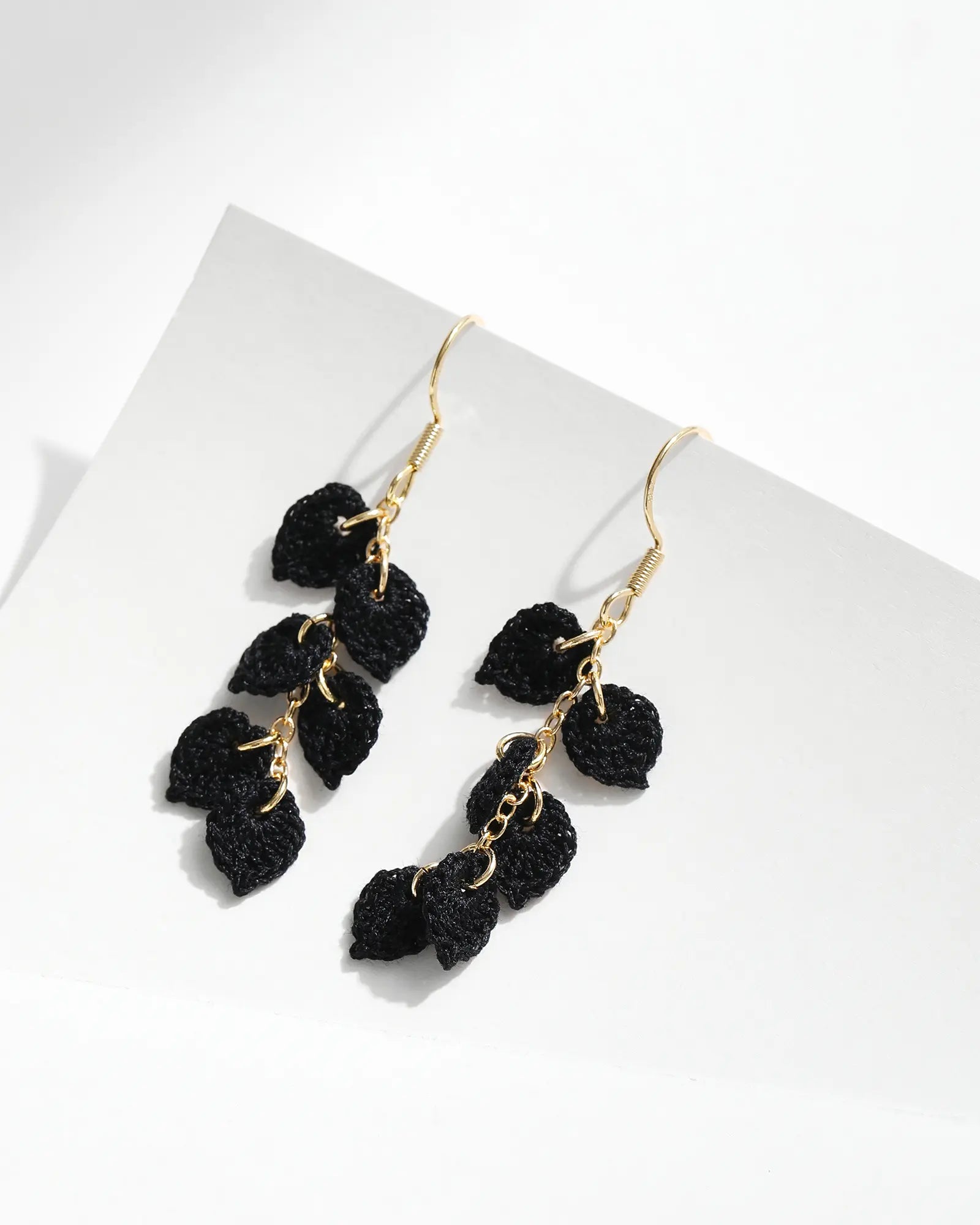 Black Tassel Leaves Drop Earrings on a white background