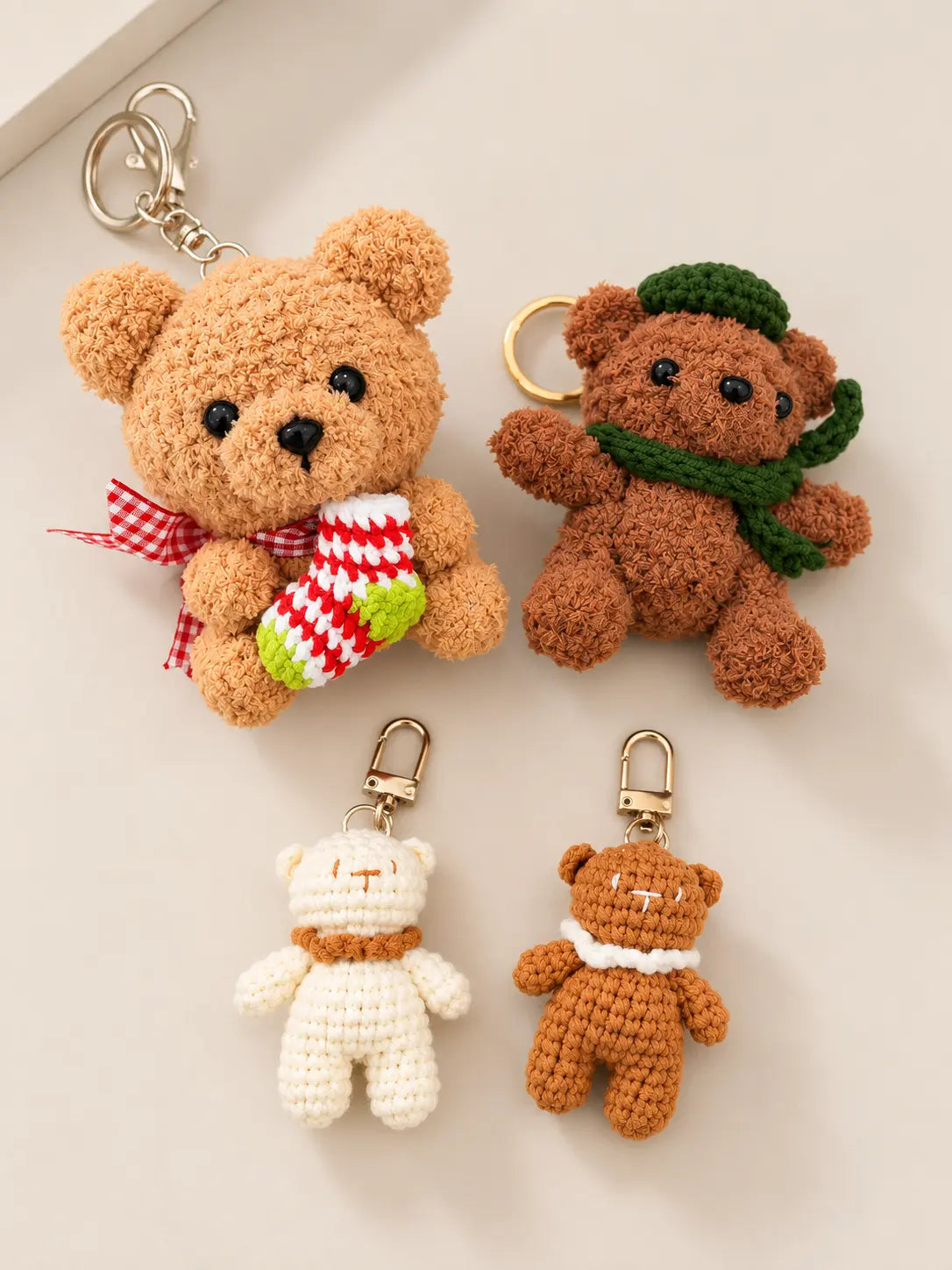 Handmade crochet bear keyrings and bag charms in four designs