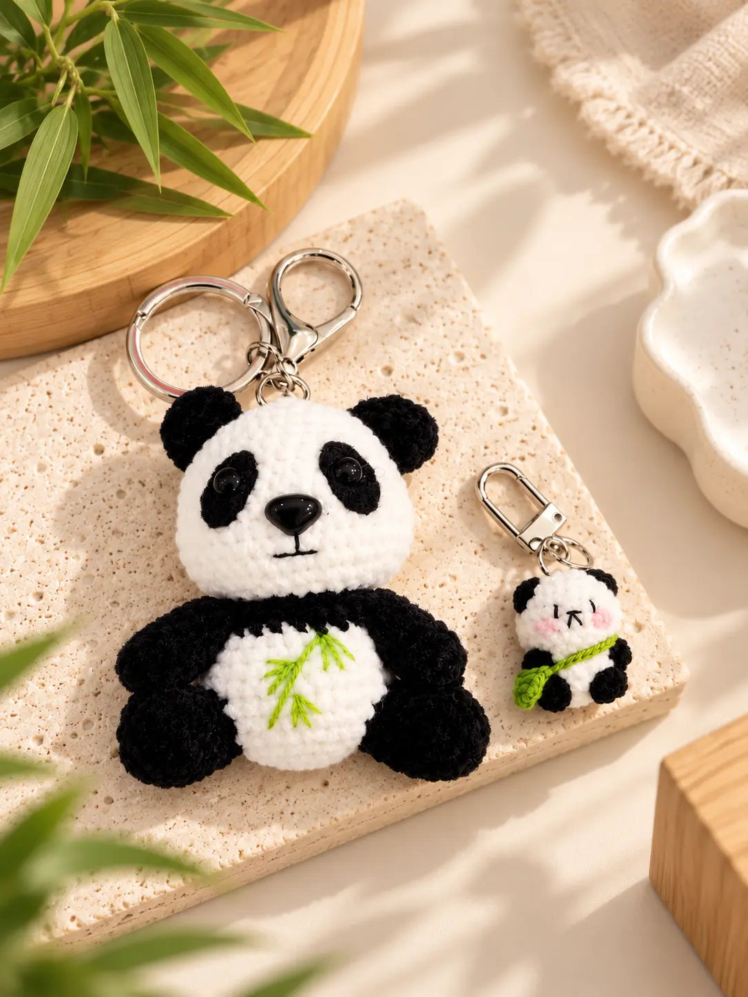Handmade crochet panda keyrings and bag charms in mini and classic designs