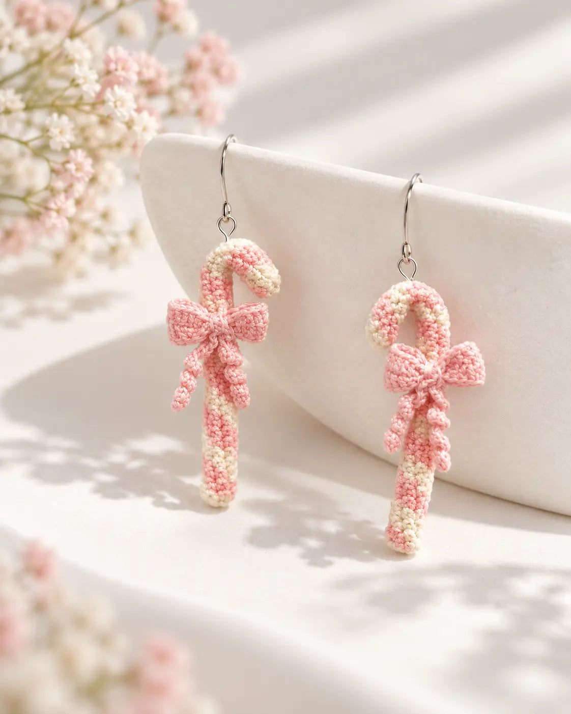 Pink candy cane bow crochet Christmas drop earrings